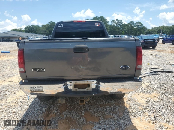 2002 Ford F-150 XL z VIN 1FTRX18L52NB59531, wystawiony jako Copart lot #58550365 z przebiegiem 267 424 mil mil oraz Szkoda całkowita • Salvage title. Historia ofert i sprzedaży dostępna na DreamBid. Obrazek 6.
