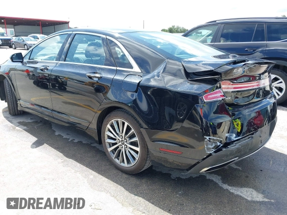 2017 Lincoln MKZ Premiere z VIN 3LN6L5A92HR628287, wystawiony jako IAAI lot #42474344 z przebiegiem 70 010 mil mil oraz . Historia ofert i sprzedaży dostępna na DreamBid. Obrazek 3.