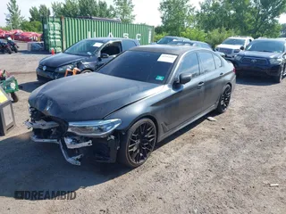 2018 BMW 5 Series M550i xDrive with VIN WBAJB9C55JB286747, listed as a IAAI auction lot 42583106 with 141,102 mi miles and . Bid and sale history available at DreamBid. Image 18.
