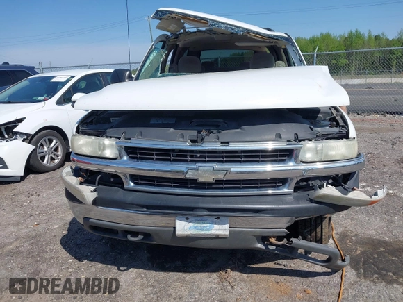 2002 Chevrolet Suburban LS z VIN 3GNEC16Z22G199485, wystawiony jako IAAI lot #41957709 z przebiegiem 252 177 mil mil oraz . Historia ofert i sprzedaży dostępna na DreamBid. Obrazek 12.