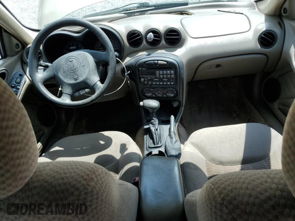 2004 Pontiac Grand Am SE1 with VIN 1G2NF52E74M568873, listed as a Copart auction lot 56187005 with 107,037 mi miles and Salvage title. Bid and sale history available at DreamBid. Image 8.