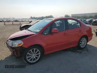 2009 Suzuki SX4 Sport FWD z VIN JS2YC414796200635, wystawiony jako Copart lot #71283934 z przebiegiem 65 627 mil mil oraz Szkoda całkowita • Salvage title. Historia ofert i sprzedaży dostępna na DreamBid. Obrazek 1.