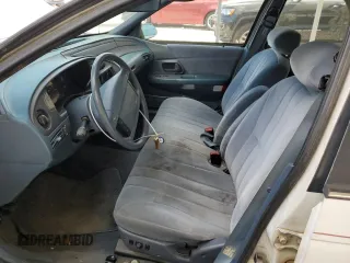1992 Ford Taurus GL z VIN 1FALP52U5NA280821, wystawiony jako Copart lot #77457304 z przebiegiem 33 484 mil mil oraz Szkoda całkowita • Salvage title. Historia ofert i sprzedaży dostępna na DreamBid. Obrazek 7.