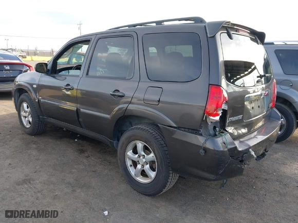 2006 Mazda Tribute LX with VIN 4F2YZ941X6KM21897, listed as a IAAI auction lot 41543057 with 155,020 mi miles. Bid and sale history available at carsss.com. Image 3.