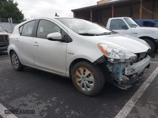 2012 Toyota Prius c One with VIN JTDKDTB36C1000279, listed as a IAAI auction lot 41491518 with NaN miles. Bid and sale history available at carsss.com. Image 1.