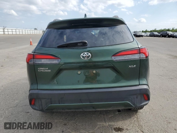 2022 Toyota Corolla Cross XLE с VIN 7MUDAAAG8NV029059, выставлен на аукционе Copart как лот 58739915 с пробегом 62 433 миль миль и Списание • Salvage title. История ставок и продаж доступна на DreamBid. Изображение 6.
