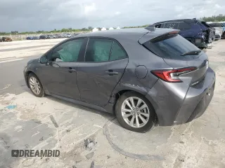 2025 Toyota Corolla Hatchback SE with VIN JTND4MBEXS3233984, listed as a Copart auction lot 73129614 with 4,581 mi miles and Salvage Title. Bid and sale history available at carsss.com. Image 2.