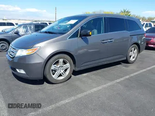 2013 Honda Odyssey Touring with VIN 5FNRL5H95DB045666, listed as a IAAI auction lot 42117219 with 50,715 mi miles and . Bid and sale history available at carsss.com. Image 17.