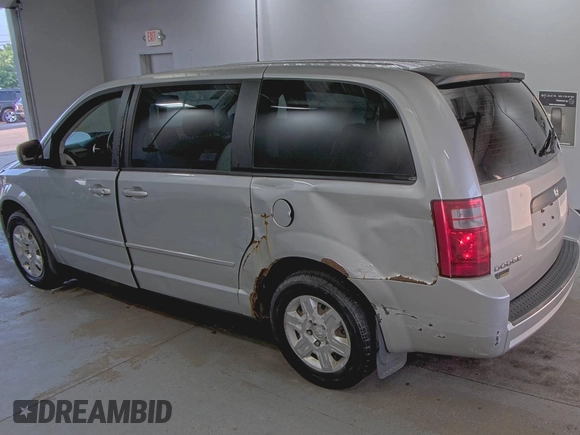 2010 Dodge Grand Caravan SE z VIN 2D4RN4DEXAR412152, wystawiony jako IAAI lot #42825395 z przebiegiem 93 398 mil mil oraz . Historia ofert i sprzedaży dostępna na DreamBid. Obrazek 9.