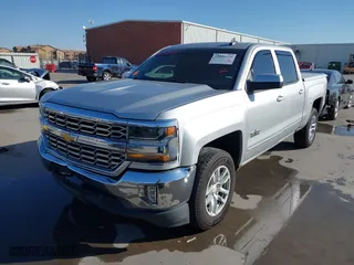 2018 Chevrolet Silverado 1500 LT with VIN 3GCPCRECXJG159263, listed as a IAAI auction lot 41856210 with 184,020 mi miles. Bid and sale history available at carsss.com. Image 2.