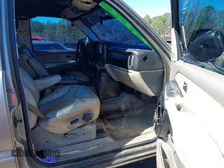 2001 GMC Yukon SLT with VIN 1GKEK13V11R220343, listed as a IAAI auction lot 41703786 with 213,518 mi miles. Bid and sale history available at carsss.com. Image 5.