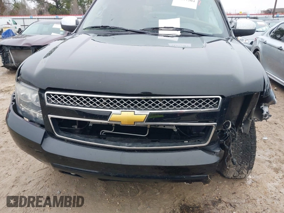 2014 Chevrolet Tahoe LT z VIN 1GNSCBE04ER143872, wystawiony jako IAAI lot #41377204 z przebiegiem 119 533 mil mil oraz . Historia ofert i sprzedaży dostępna na DreamBid. Obrazek 12.