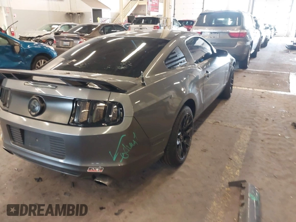 2013 Ford Mustang V6 with VIN 1ZVBP8AM3D5242145, listed as a IAAI auction lot 41626383 with 104,685 mi miles and . Bid and sale history available at DreamBid. Image 4.