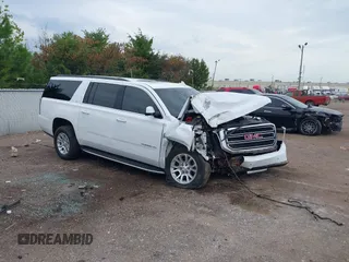 2019 GMC Yukon XL SLT with VIN 1GKS2GKC2KR369285, listed as a IAAI auction lot 40279008 with Not Provided miles and . Bid and sale history available at carsss.com. Image 1.