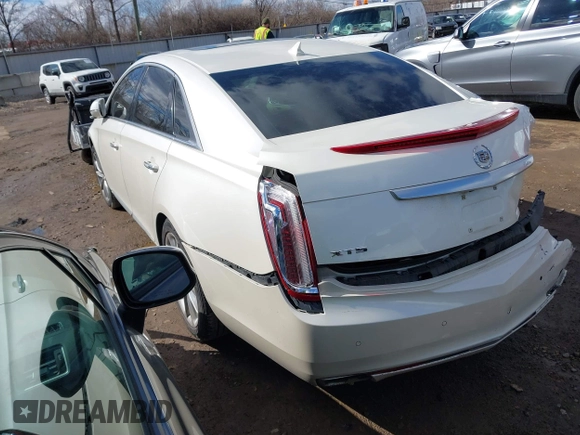 2014 Cadillac XTS Premium with VIN 2G61P5S38E9124277, listed as a IAAI auction lot 41744734 with 136,223 mi miles. Bid and sale history available at carsss.com. Image 3.