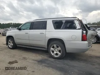 2016 Chevrolet Suburban LT with VIN 1GNSCHKC0GR162715, listed as a Copart auction lot 51071924 with 247,376 mi miles and . Bid and sale history available at DreamBid. Image 2.