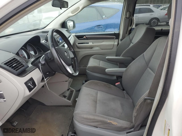 2009 Volkswagen Routan SE with VIN 2V8HW34139R582544, listed as a Copart auction lot 74354054 with 136,528 mi miles and Salvage Title. Bid and sale history available at carsss.com. Image 7.
