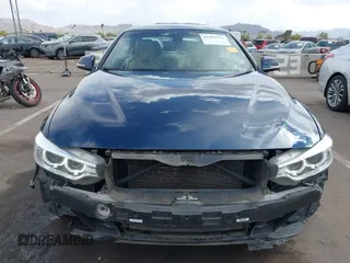 2014 BMW 4 Series 428i with VIN WBA3V5C52EJ968893, listed as a IAAI auction lot 41955531 with 91,090 mi miles and . Bid and sale history available at DreamBid. Image 6.