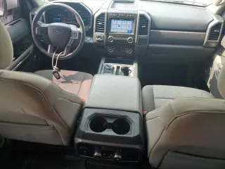2019 Ford Expedition XLT with VIN 1FMJU1HT3KEA48235, listed as a Copart auction lot 58301275 with 104,919 mi miles and Salvage title. Bid and sale history available at DreamBid. Image 8.