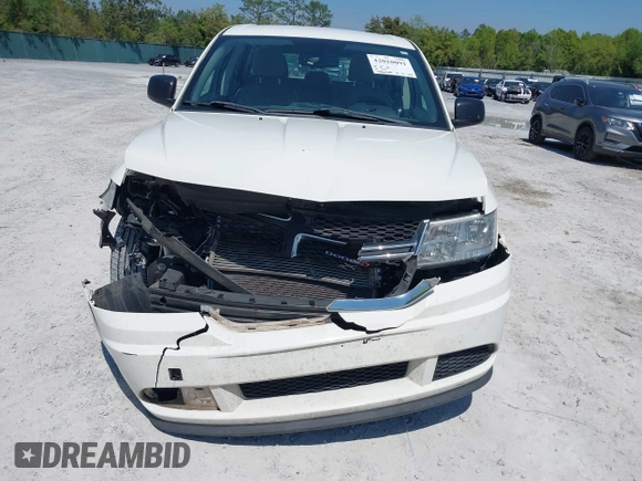 2015 Dodge Journey SE z VIN 3C4PDCAB7FT572716, wystawiony jako IAAI lot #42010091 z przebiegiem 186 489 mil mil oraz . Historia ofert i sprzedaży dostępna na DreamBid. Obrazek 11.