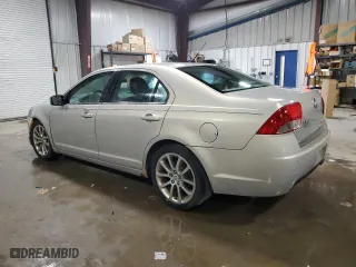 2010 Mercury Milan Premier with VIN 3MEHM0JA1AR631497, listed as a Copart auction lot 69861084 with 163,326 mi miles and Salvage Title. Bid and sale history available at carsss.com. Image 2.