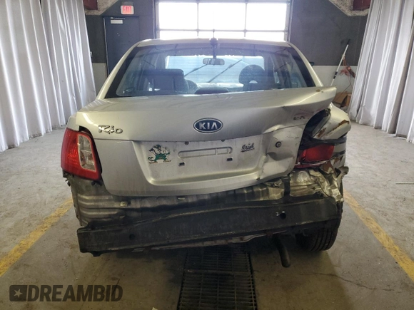2010 Kia Rio LX with VIN KNADH4A34A6643716, listed as a Copart auction lot 46880375 with 112,265 mi miles and Salvage Title. Bid and sale history available at carsss.com. Image 6.