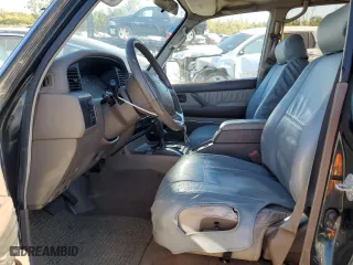 1996 Toyota Land Cruiser with VIN JT3HJ85J8T0140189, listed as a Copart auction lot 76720784 with 167,649 mi miles and Salvage Title. Bid and sale history available at carsss.com. Image 7.