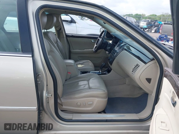 2009 Cadillac DTS 1SA z VIN 1G6KD57Y19U127449, wystawiony jako IAAI lot #42116152 z przebiegiem 107 901 mil mil oraz . Historia ofert i sprzedaży dostępna na DreamBid. Obrazek 5.