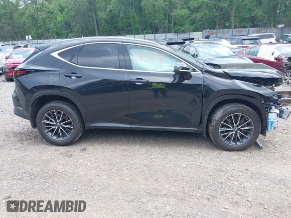 2023 Lexus NX 350h Premium z VIN 2T2GKCEZXPC012895, wystawiony jako IAAI lot #42690037 z przebiegiem 31 197 mil mil oraz . Historia ofert i sprzedaży dostępna na DreamBid. Obrazek 14.
