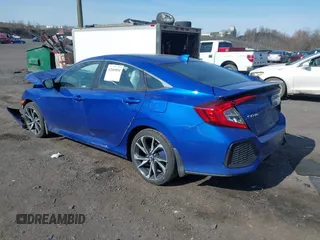2018 Honda Civic Si z VIN 2HGFC1E52JH709085, wystawiony jako IAAI lot #42069894 z przebiegiem 65 427 mil mil oraz . Historia ofert i sprzedaży dostępna na DreamBid. Obrazek 3.