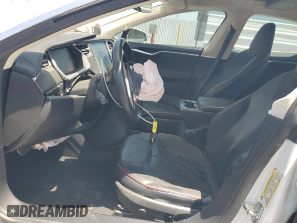 2013 Tesla Model S Performance с VIN 5YJSA1DP3DFP10567, выставлен на аукционе Copart как лот 58352955 с пробегом 128 438 миль миль и Списание • Salvage title. История ставок и продаж доступна на DreamBid. Изображение 7.