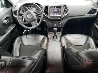 2019 Jeep Cherokee Trailhawk with VIN 1C4PJMBX9KD393862, listed as a Copart auction lot 56695905 with 64,334 mi miles and Salvage title. Bid and sale history available at DreamBid. Image 8.