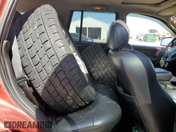 2002 Jeep Grand Cherokee Limited with VIN 1J4GW58N82C182603, listed as a Copart auction lot 57464295 with 240,179 mi miles and Salvage title. Bid and sale history available at DreamBid. Image 10.