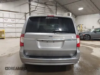 2013 Chrysler Town & Country Touring with VIN 2C4RC1BG0DR775313, listed as a IAAI auction lot 41738917 with 209,378 mi miles. Bid and sale history available at carsss.com. Image 16.