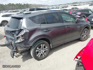 2016 Toyota RAV4 LE with VIN JTMZFREV2GJ092537, listed as a IAAI auction lot 41794148 with 145,678 mi miles. Bid and sale history available at carsss.com. Image 4.