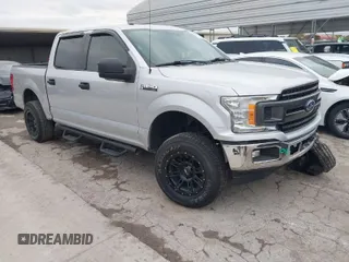 2018 Ford F-150 XL with VIN 1FTEW1CG7JKE47630, listed as a IAAI auction lot 41032441 with 146,230 mi miles. Bid and sale history available at carsss.com. Image 1.