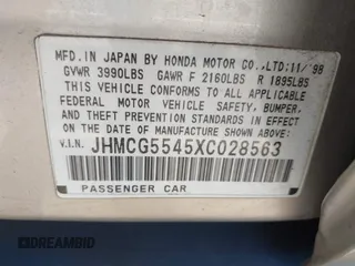 1999 Honda Accord LX with VIN JHMCG5545XC028563, listed as a IAAI auction lot 42461054 with 212,100 mi miles and . Bid and sale history available at DreamBid. Image 9.