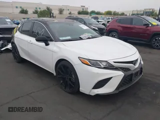 2018 Toyota Camry LE z VIN 4T1B11HK7JU111555, wystawiony jako IAAI lot #42421362 z przebiegiem 102 404 mil mil oraz . Historia ofert i sprzedaży dostępna na DreamBid. Obrazek 14.