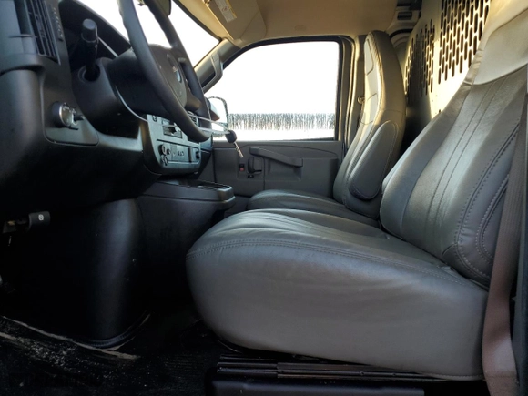 2023 GMC Savana Cargo Van with VIN 1GTW7BFP5P1106258, listed as a Copart auction lot 84307974 with 34,638 mi miles and Non Repairable. Bid and sale history available at carsss.com. Image 7.