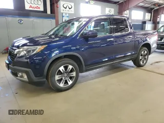 2019 Honda Ridgeline RTL-E with VIN 5FPYK3F76KB008067, listed as a Copart auction lot 66334745 with 214,885 mi miles and Clean title. Bid and sale history available at DreamBid. Image 1.