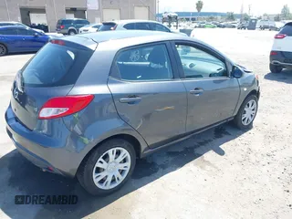 2014 Mazda 2 Sport z VIN JM1DE1KY8E0172828, wystawiony jako IAAI lot #42374758 z przebiegiem 120 180 mil mil oraz . Historia ofert i sprzedaży dostępna na DreamBid. Obrazek 4.