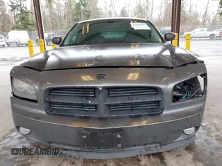 2010 Dodge Charger SXT with VIN 2B3CA3CV1AH250204, listed as a IAAI auction lot 41692787 with 111,757 mi miles. Bid and sale history available at carsss.com. Image 13.