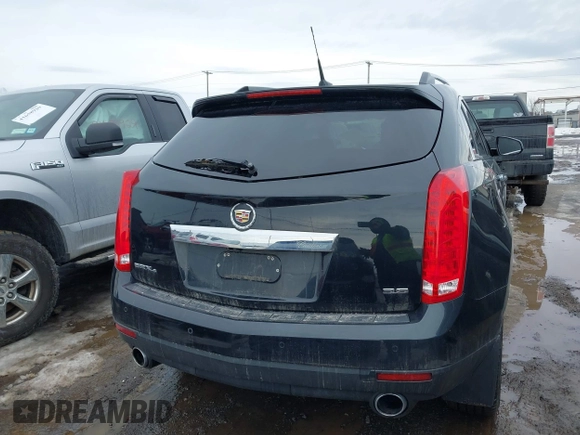 2013 Cadillac SRX Performance Collection with VIN 3GYFNHE33DS527519, listed as a IAAI auction lot 41652822 with 201,580 mi miles. Bid and sale history available at carsss.com. Image 16.