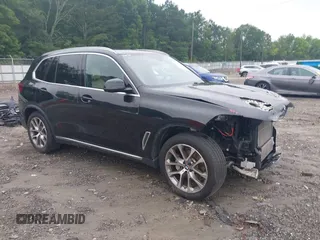 2021 BMW X5 sDrive40i with VIN 5UXCR4C06M9G60388, listed as a IAAI auction lot 42502013 with 34,601 mi miles and . Bid and sale history available at DreamBid. Image 1.