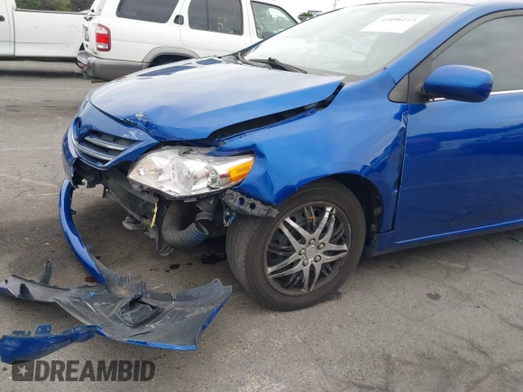 2013 Toyota Corolla L with VIN 5YFBU4EE8DP166741, listed as a IAAI auction lot 41896115 with 154,011 mi miles. Bid and sale history available at carsss.com. Image 6.