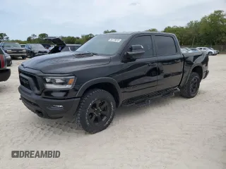 2023 Ram 1500 Rebel with VIN 1C6SRFLT8PN609879, listed as a Copart auction lot 55176515 with 15,466 mi miles and Salvage title. Bid and sale history available at DreamBid. Image 1.