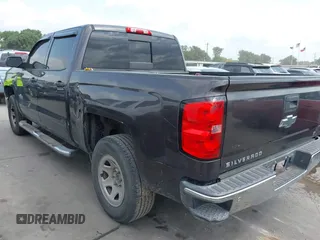 2015 Chevrolet Silverado 1500 LT with VIN 3GCPCREC7FG411610, listed as a IAAI auction lot 41975360 with 243,335 mi miles and . Bid and sale history available at DreamBid. Image 3.