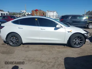 2020 Tesla Model 3 Long Range with VIN 5YJ3E1EBXLF636963, listed as a IAAI auction lot 41826249 with 68,085 mi miles. Bid and sale history available at carsss.com. Image 14.