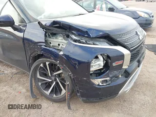 2022 Mitsubishi Outlander SE z VIN JA4J3UA84NZ086496, wystawiony jako IAAI lot #41954802 z przebiegiem 85 357 mil mil oraz . Historia ofert i sprzedaży dostępna na DreamBid. Obrazek 6.