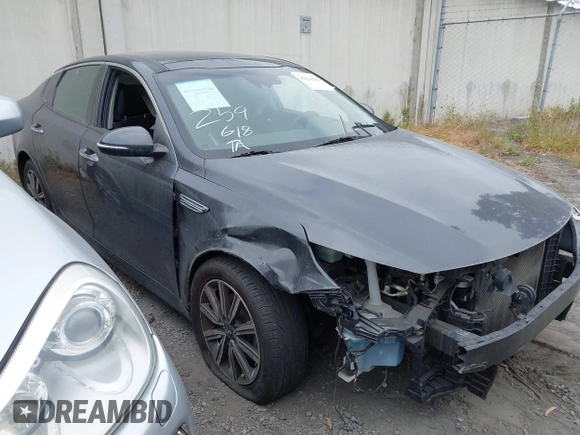 2019 Kia Optima LX z VIN 5XXGT4L38KG319215, wystawiony jako IAAI lot #42226251 z przebiegiem 70 449 mil mil oraz . Historia ofert i sprzedaży dostępna na DreamBid. Obrazek 1.